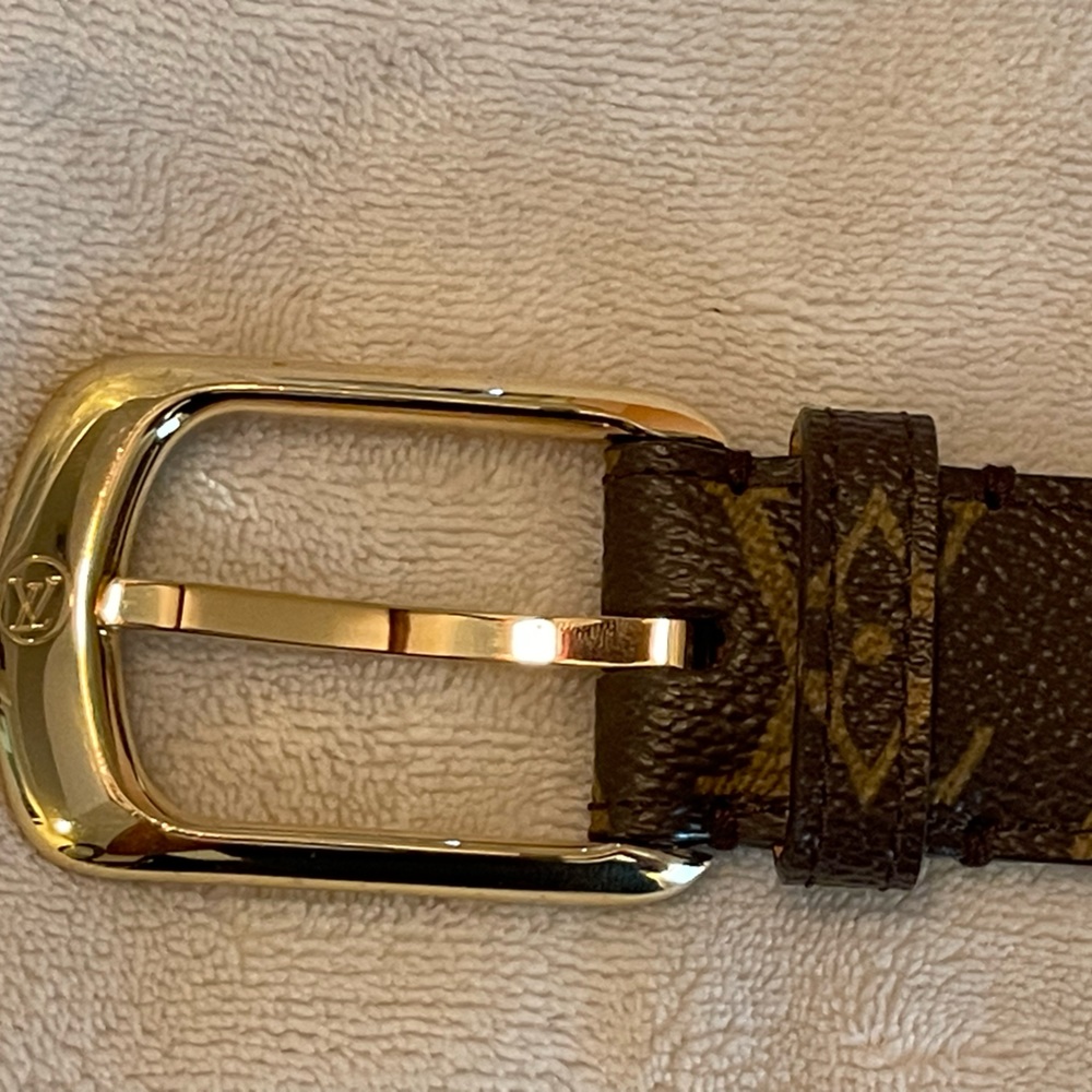 Louis Vuitton Brown canvas belt gently used no major scuffs with 1 extra hole